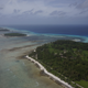 Aerial photograph of Kwajalein Atoll showing its low-lying islands and coral reefs.